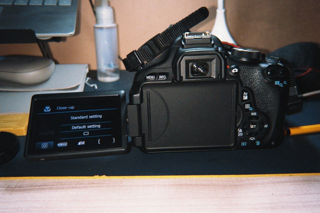 Canon EOS 600D DSLR Camera with Lens (Category: Cameras) located in Cebu City. Submitted by _____08_____ (Listing ID 1404827106, Image 3). Description: - RFS: hasn’t been used anymore (was for college) - Canon EOS 600D DSLR camera - 18-55mm lens included - Features a flip-out LCD screen - Built-in flash - Includes: lens cap, body cap, battery, charger, cables, cleaning cloth, and camera bag (rusty) - Comes with a camera strap - Issue: Last image 