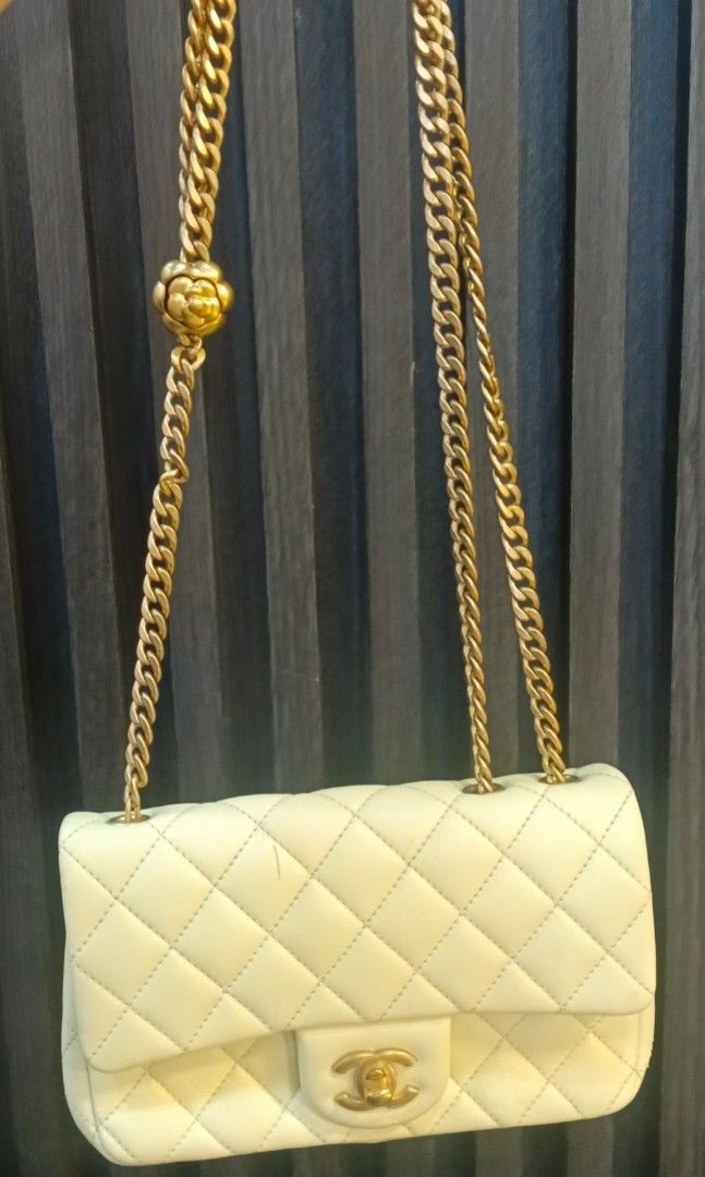 Chanel mini flap Bag (Category: Luxury Bags & Wallets) located in Legazpi City. Submitted by georgepineda791 (Listing ID 1404777633, Image 1). Description: Preloved Chanel Mini Flap in lambskin ✨ Quilted with matte gold hardware and a rare flower-design push-button chain for easy adjusting. With CC underzip & verification chip. Minimal flaws only—tiny hairline scratches that don’t lessen its beauty at all. Ukay-selected and very rare. Price is ju