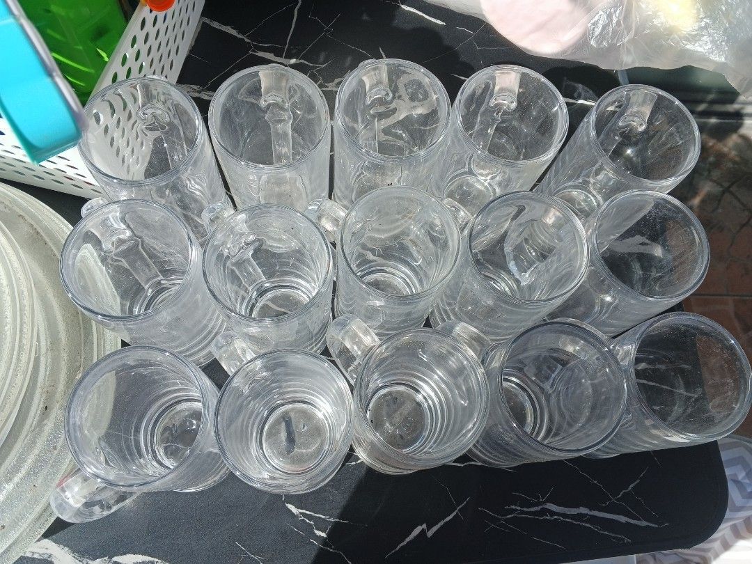 Clear Glass Beer Mugs (Category: Other Kitchenware & Tableware) located in Caloocan City. Submitted by surplusandbnewshop (Listing ID 1404839824, Image 3). Description: - Set of clear glass beer mugs - Classic design with handles - Suitable for serving various beverages - Ideal for home use.