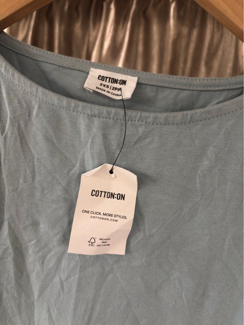 Cotton On Sleeveless Dress (Category: Dresses) located in Caloocan City. Submitted by nnnprelovedclothes (Listing ID 1404940764, Image 2). Description: - Cotton On sleeveless dress - Light blue color - Size: S-M - Made in China - Simple, casual design - Versatile for various occasions.