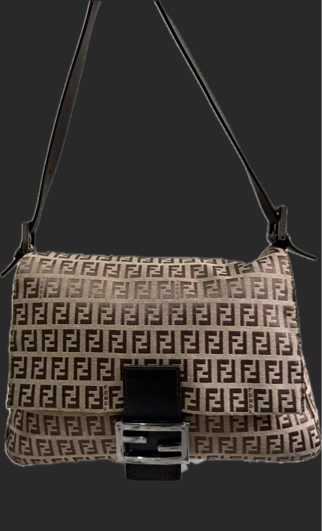 Fendi Mama Baguette (Category: Luxury Bags & Wallets) located in Mandaluyong City. Submitted by solize_closet (Listing ID 1377815339, Image 2). Description: Negotiable!!! Fendi Mama Baguette with minimal hairline scratches but totally not visible (see photo) For SURE Buyer may request detailed photo Inclusions: Cards Dustbag RFS: Need cash STUDY THE BAG YOU WANT. If in doubt please let us not waste each other time. 😉 thank you🫶 ***For Meet up, 