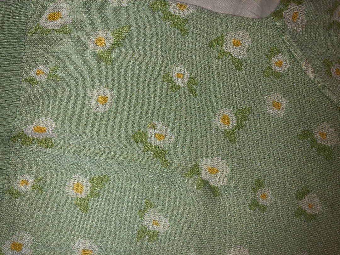 Floral Print Short Sleeve Sweater (Category: Others Tops) located in Taguig. Submitted by teresitap10129 (Listing ID 1404860477, Image 3). Description: - Short-sleeved sweater - Light green color - White and yellow floral print - Round neckline - Ribbed hem and cuffs - Knit fabric - Casual style If you buy 2 or more from my listings, you will get this for free! :)).