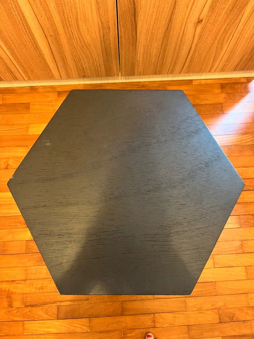 Hexagonal Black Side Table (Category: Tables & Sets) located in Singapore. Submitted by shellybombom (Listing ID 1404921672, Image 2). Description: - Stylish hexagonal side table - Unique cut-out design - good condition but some scuffs (see photos) - W51cm H45.5cm - price negotiable .