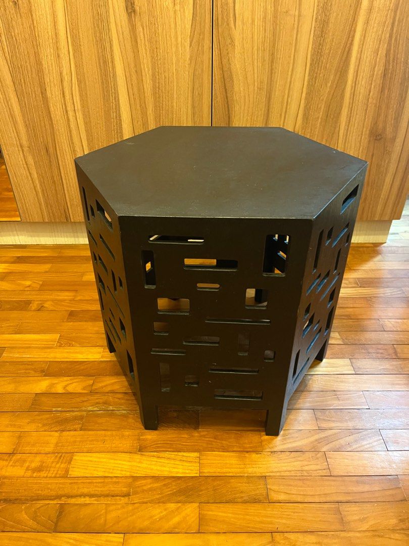 Hexagonal Black Side Table (Category: Tables & Sets) located in Singapore. Submitted by shellybombom (Listing ID 1404921672, Image 1). Description: - Stylish hexagonal side table - Unique cut-out design - good condition but some scuffs (see photos) - W51cm H45.5cm - price negotiable .