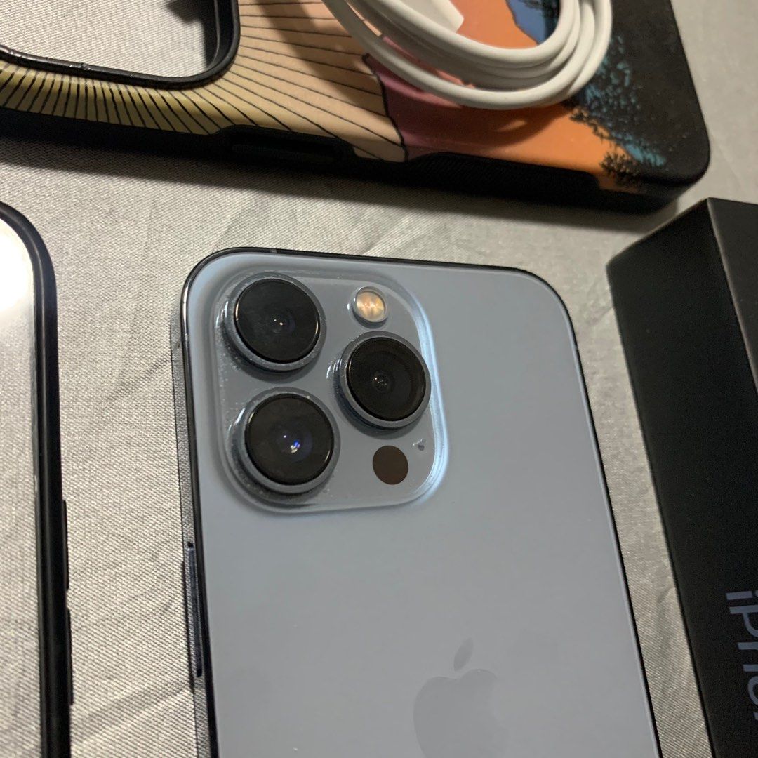 iPhone 13 Pro 256 75BH (Category: iPhone 11 Series) located in Cabanatuan. Submitted by jjavate25 (Listing ID 1404906919, Image 2). Description: - iPhone 13 Pro - 256GB Storage - Silver Color - 75% Battery Health - Includes original box - Comes with charging cable - Includes two cases Issue: Minor Dent SIERRA BLUE COLOR .