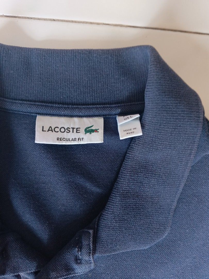 Lacoste Regular Fit Polo Shirt (Category: Tshirts & Polo Shirts ) located in Tacurong. Submitted by markisells (Listing ID 1404807219, Image 2). Description: - Navy blue Lacoste polo shirt - Regular fit, short sleeves - Made in FRANCE - Size L - EXCELLENT CONDITION - NEED WASH W:20 L:29.