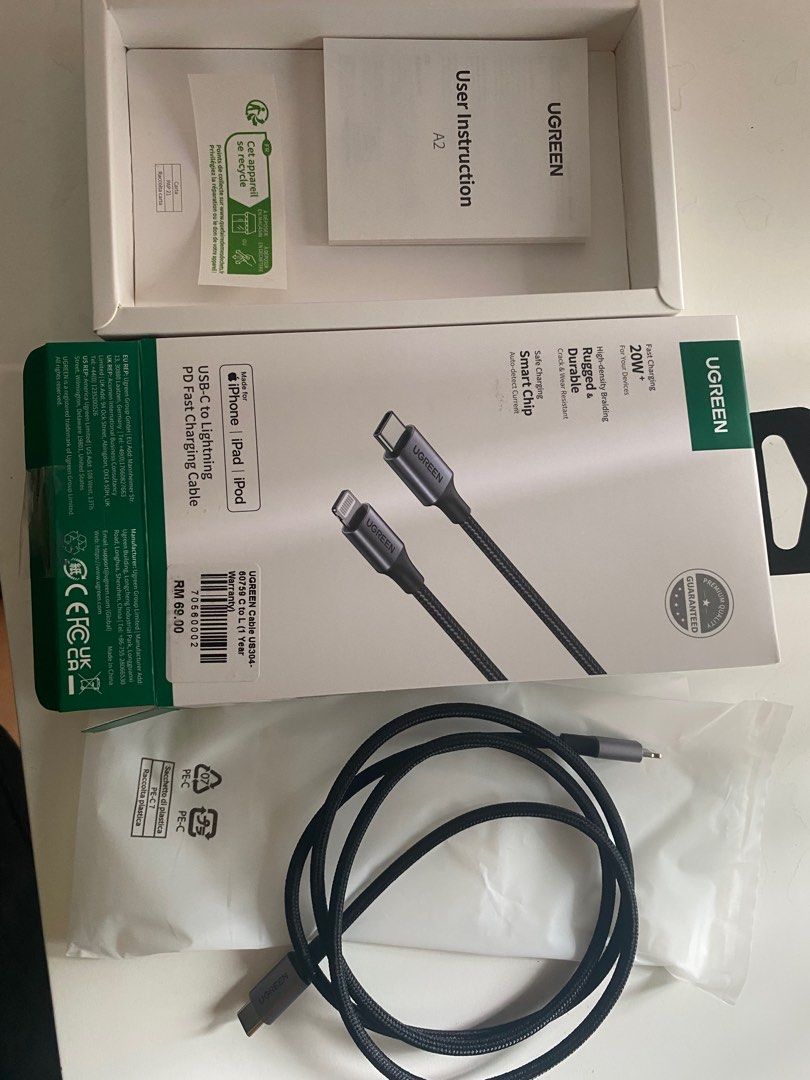 Lightning Cable (Category: Chargers & Cables) located in Kuala Lumpur. Submitted by theflow_8 (Listing ID 1404798404, Image 2). Description: Just use 1x ( Still New ) -Original price RM69, selling for RM50 - UGREEN USB-C to Lightning Cable - 1 meter length - Black color - Supports fast charging (20W+) - Durable braided design - Compatible with iPhone, iPad, and iPod.