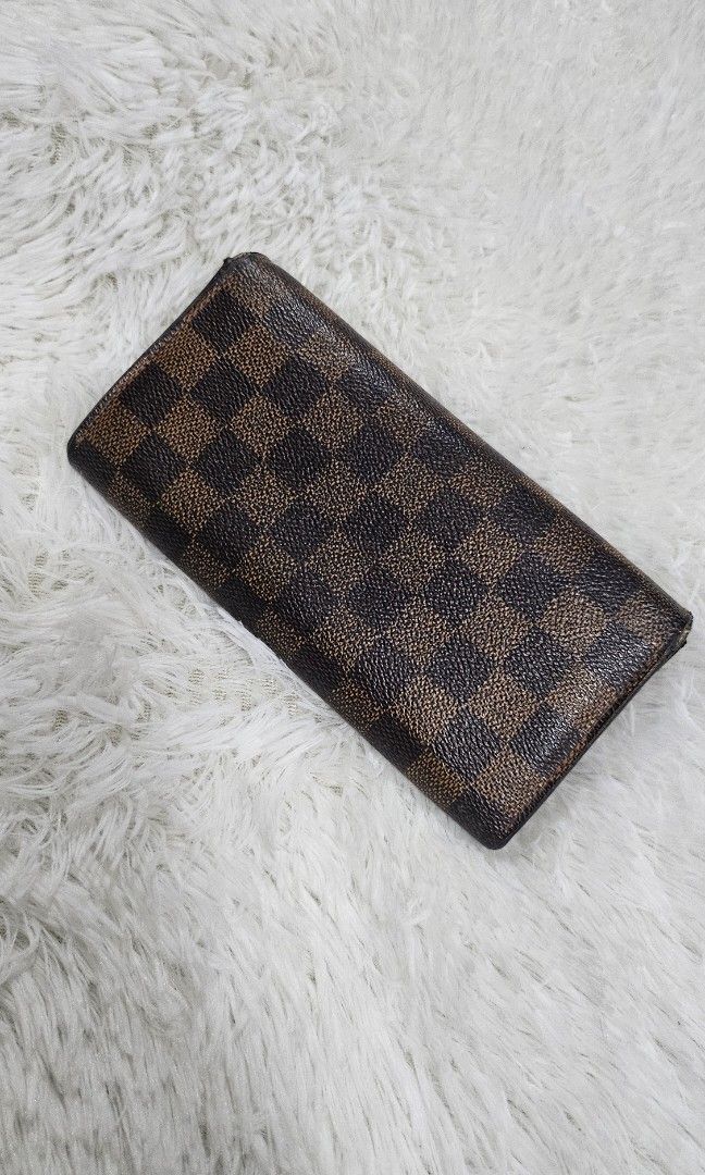 Louis Vuitton Sarah Wallet (Category: Luxury Bags & Wallets) located in Quezon City. Submitted by tellmystore (Listing ID 1404869238, Image 2). Description: Japan Pre-loved Louis Vuitton Sarah Wallet in good condition..