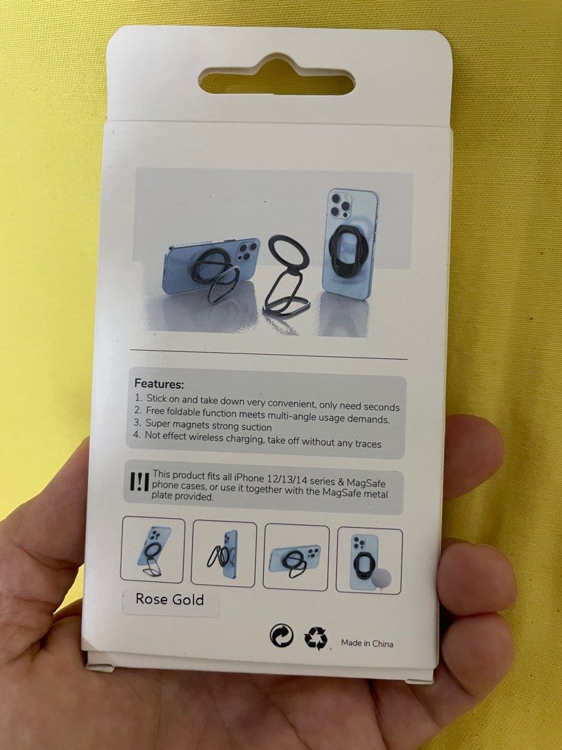 Magnetic Phone Holder - Rose Gold (Category: Mounts & Holders) located in Manila. Submitted by winnieyols (Listing ID 1404905825, Image 3). Description: Magnetic phone holder is designed for iPhone 12/13/14 series and MagSafe phone cases. It features a built-in strong magnet for secure attachment and a foldable design for multi-angle usage. The holder allows for easy stick-on and take-down, and it does not affect wireless charging. The color is r