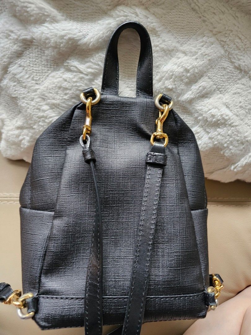 Mini Backpack (Category: Backpacks) located in Singapore. Submitted by tnpt.88 (Listing ID 1404855346, Image 3). Description: Only bag. The material is tearing and peeling, not for fussy buyer..