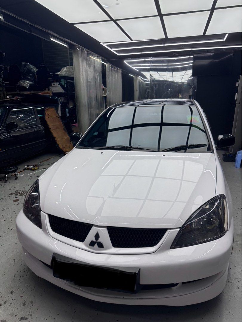 Mitsubishi Lancer 1.6 GLX (M) (Category: Used Cars) located in Singapore. Submitted by syad23 (Listing ID 1404850723, Image 1). Description: •recently serviced •Drift racing exhaust with cert Got lot to say about the car come in person and view the car.