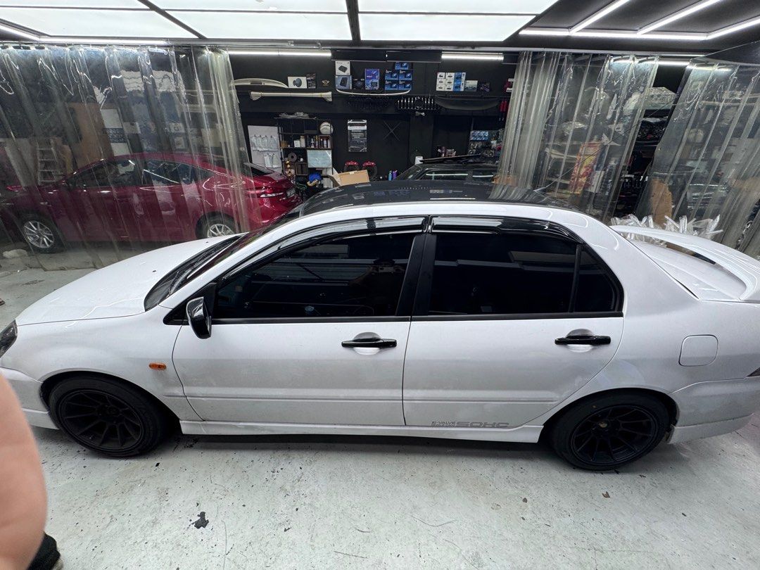 Mitsubishi Lancer 1.6 GLX (M) (Category: Used Cars) located in Singapore. Submitted by syad23 (Listing ID 1404850723, Image 2). Description: •recently serviced •Drift racing exhaust with cert Got lot to say about the car come in person and view the car.