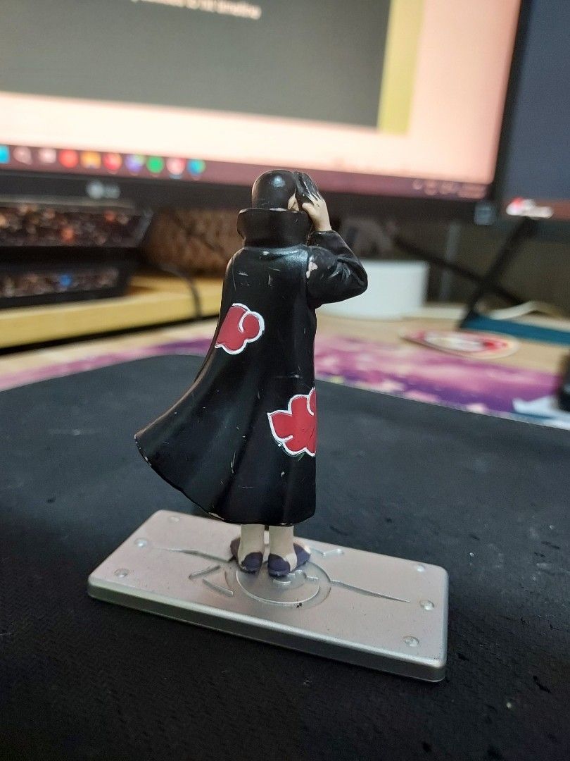 Naruto Ningyou - Itachi (Category: Figurines & Statues) located in Imus. Submitted by codemafia (Listing ID 1404791542, Image 2). Description: authentic comes with rogue konoha ninja base please check images for some flaws.