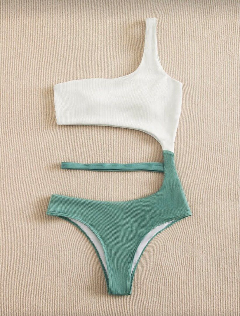 Two Tone Rib One Shoulder One Piece Swimsuit (Category: Bikinis & Swimsuits) located in Quezon City. Submitted by dettesy (Listing ID 1404908328, Image 3). Description: Never used. Make waves in style! One-shoulder swimsuit with a unique cutout design. Chic white top meets teal green ribbed bottom for a trendy, flattering look. Perfect for pool days or beach vibes—turn heads wherever you go. .