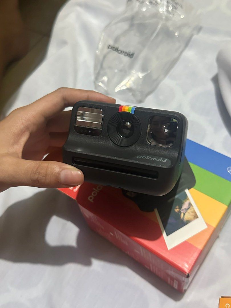 Polaroid Go Instant Camera (Category: Cameras) located in Manila. Submitted by cropptspicy (Listing ID 1404883732, Image 1). Description: polaroid go, black - box - manual - stickers - charger - strap.