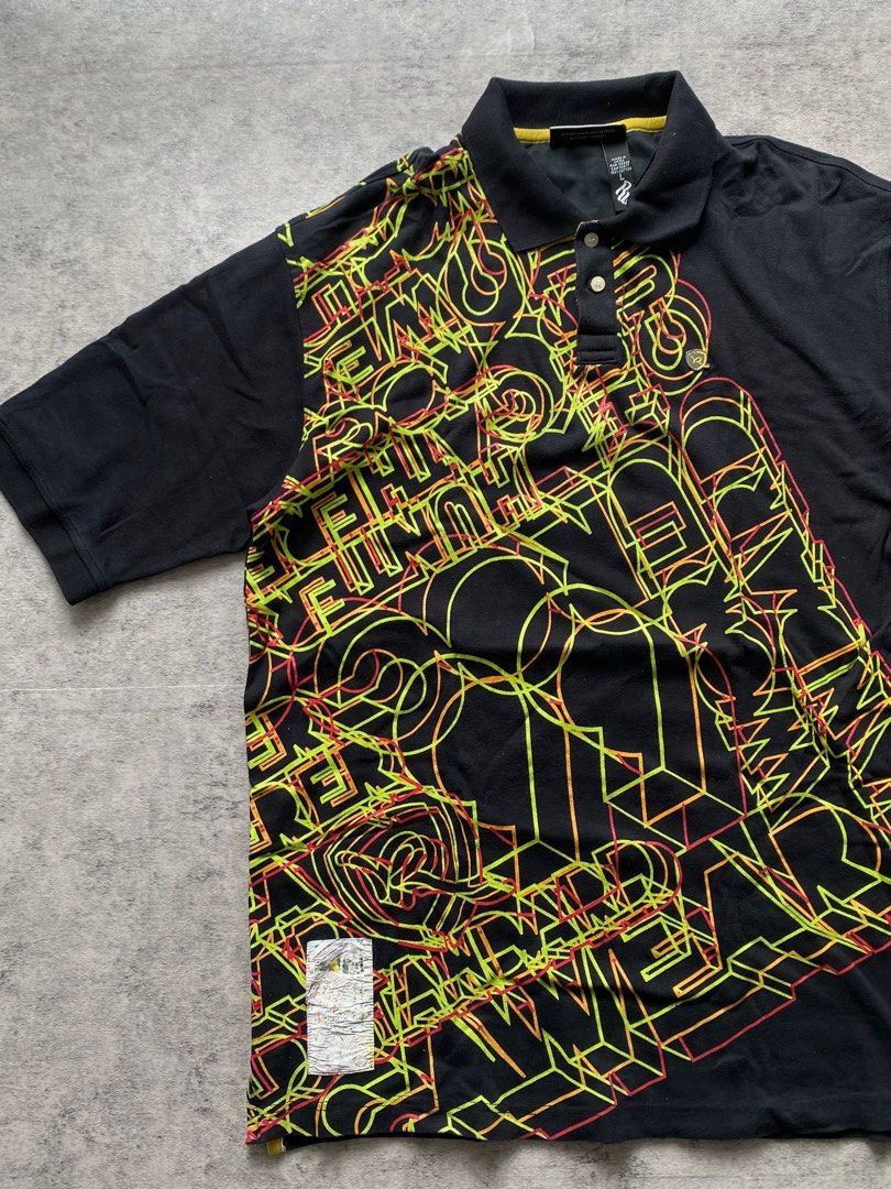 Rocawear Graphic Polo Shirt - Black (Category: Tshirts & Polo Shirts ) located in San Juan City. Submitted by deyberry (Listing ID 1404901600, Image 2). Description: ROC Polo Shirt Length - 32 inches Width - 23 inches Excellent condition 900.