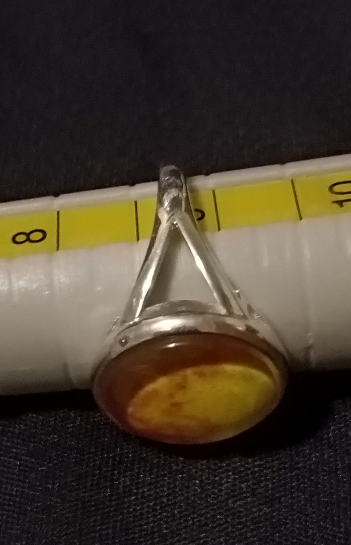 (size 9) 100% Legit Genuine 925 Silver Ring with Yellow Round Moon-dome Glass (Category: Rings) located in Manila. Submitted by mhar_declutter (Listing ID 1404881469, Image 2). Description: - pure 925 Silver ring - Yellow Round Moon-dome Glass - Band marked "925" - Adjustable size - Suitable for everyday wear or special occasions.