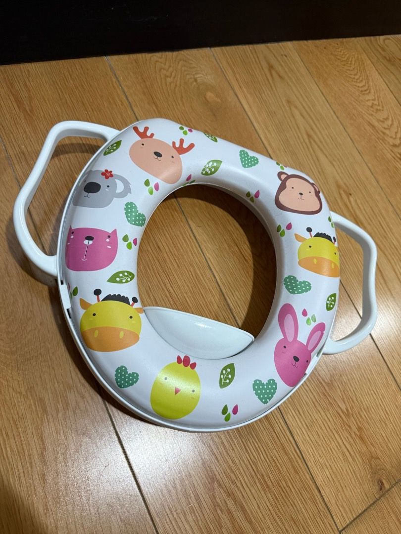 Soft Potty Adaptor Seat (Category: Toilet Training) located in Taguig. Submitted by debeardebar (Listing ID 1404910937, Image 1). Description: Soft Potty Adaptor Seat like new, never used Pick-up in BGC Gcash / Cash payment only Buyer bear delivery cost Mothercare, Stokke.