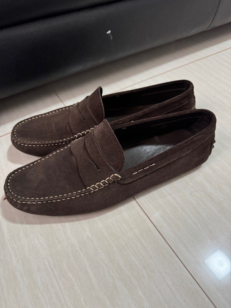 Tod's Suede Loafers - Men's Size 9.5 (Category: Dress Shoes) located in Cebu City. Submitted by wickwoo (Listing ID 1404782049, Image 3). Description: - Authentic Tod's loafers - Brown suede - Classic penny loafer design - Men's size: 9.5 - Made in Italy - White stitching detail - Rubber pebble sole - Tod's logo stamped inside - Soles show wear.