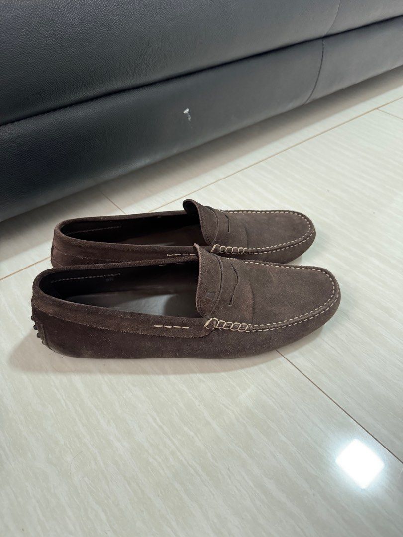 Tod's Suede Loafers - Men's Size 9.5 (Category: Dress Shoes) located in Cebu City. Submitted by wickwoo (Listing ID 1404782049, Image 1). Description: - Authentic Tod's loafers - Brown suede - Classic penny loafer design - Men's size: 9.5 - Made in Italy - White stitching detail - Rubber pebble sole - Tod's logo stamped inside - Soles show wear.