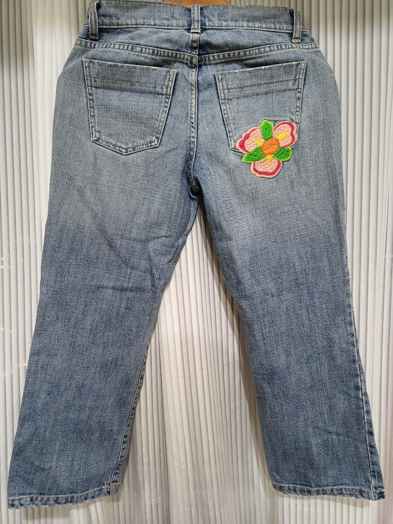 Tommy Hilfiger Embroidered Jeans (Category: Jeans) located in Manila. Submitted by keith_ul (Listing ID 1404963381, Image 1). Description: - Tommy Hilfiger denim jeans - Light wash - Embroidered floral details (front and back) - Straight leg cut - Classic five-pocket design.