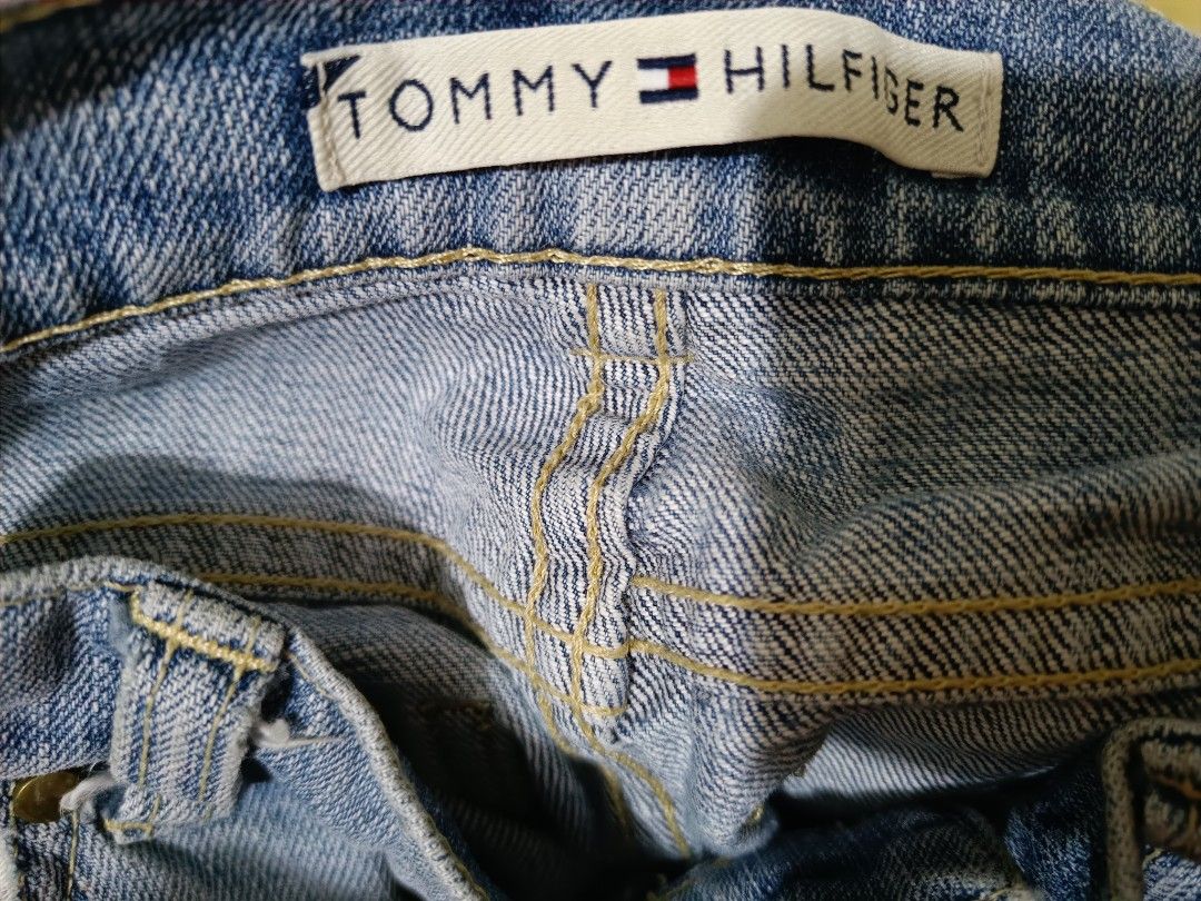 Tommy Hilfiger Embroidered Jeans (Category: Jeans) located in Manila. Submitted by keith_ul (Listing ID 1404963381, Image 3). Description: - Tommy Hilfiger denim jeans - Light wash - Embroidered floral details (front and back) - Straight leg cut - Classic five-pocket design.