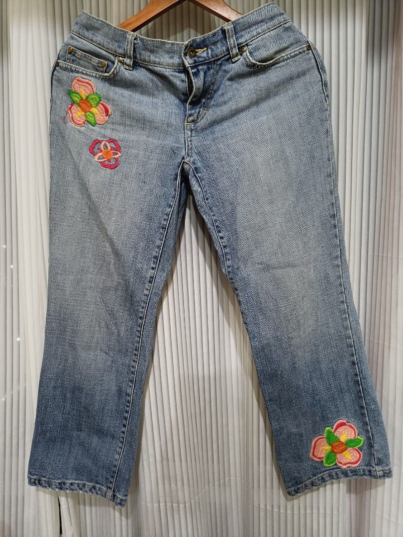Tommy Hilfiger Embroidered Jeans (Category: Jeans) located in Manila. Submitted by keith_ul (Listing ID 1404963381, Image 2). Description: - Tommy Hilfiger denim jeans - Light wash - Embroidered floral details (front and back) - Straight leg cut - Classic five-pocket design.