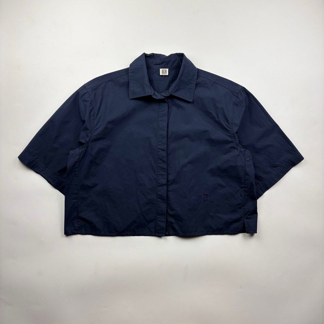 Toteme Cropped Poplin Shirt (Category: Shirts) located in Makati City. Submitted by ragrepository (Listing ID 1404806690, Image 1). Description: Toteme Cropped Poplin Shirt Tagged as XS Length-19.5” Pit to pit- 22” Shoulder-18” Sleeves-11” Condition-9/10 Flaw-None .