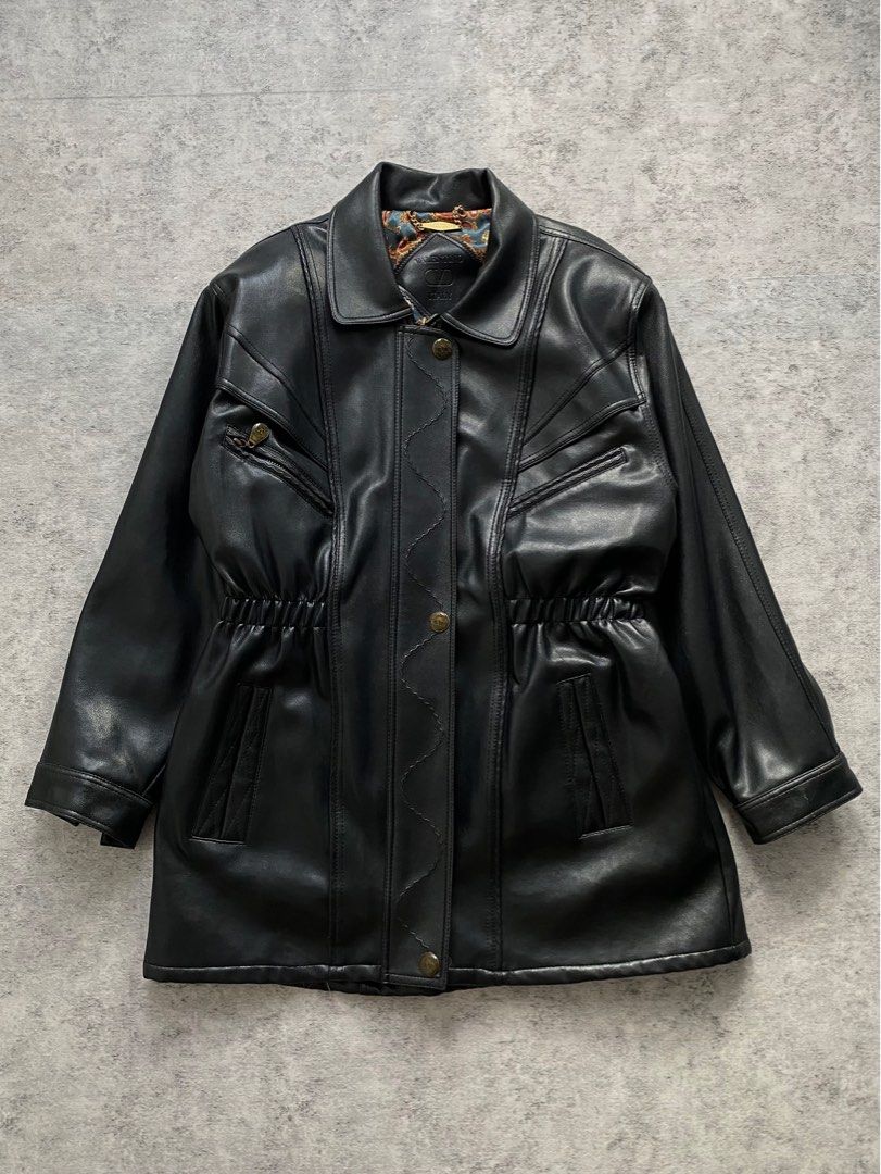 Valentino Italy Black Leather Jacket (Category: Coats, Jackets and Outerwear) located in San Juan City. Submitted by deyberry (Listing ID 1404908011, Image 1). Description: Vintage Valentino Black Leather Jacket Length - 32 inches Width - 20 inches Minimal scratches and holes Excellent condition 6000.
