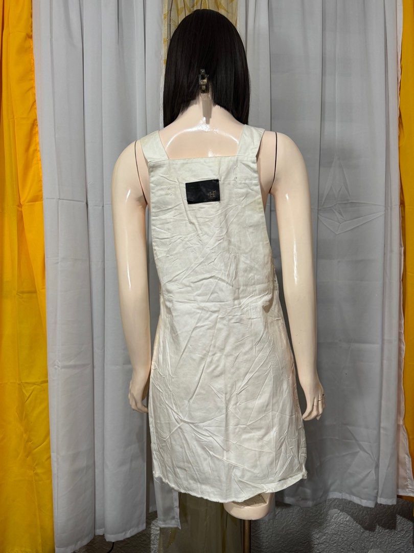 White Denim Lace-Up Mini Dress (Category: Dresses) located in Quezon City. Submitted by everydayessentialsstudio (Listing ID 1359625830, Image 3). Description: A cute white denim mini dress featuring a lace-up ribbon detail in front. Slightly structured, stylish, and perfect for casual days. #DenimDressPH #WhiteDress #PrelovedFinds #ClosetReVibe #CasualChic.