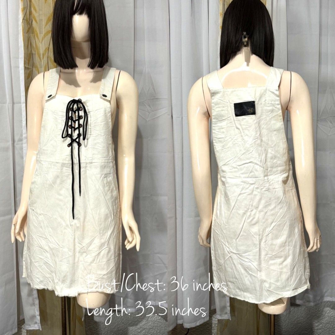 White Denim Lace-Up Mini Dress (Category: Dresses) located in Quezon City. Submitted by everydayessentialsstudio (Listing ID 1359625830, Image 1). Description: A cute white denim mini dress featuring a lace-up ribbon detail in front. Slightly structured, stylish, and perfect for casual days. #DenimDressPH #WhiteDress #PrelovedFinds #ClosetReVibe #CasualChic.