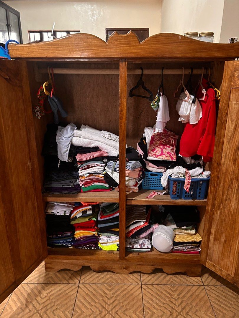 Wooden Cabinet with Two Doors (Category: Shelves, Cabinets & Racks) located in Quezon City. Submitted by albertgtaule (Listing ID 1404860685, Image 2). Description: Hello! I am selling this cabinet for ₱15,000, slightly negotiable. It’s made of pure narra wood. Buyer will arrange and shoulder the transport fee. Reason for selling: We are doing a total house renovation, and it no longer matches the theme of our new home. Location: Brgy. Bukal, Pag