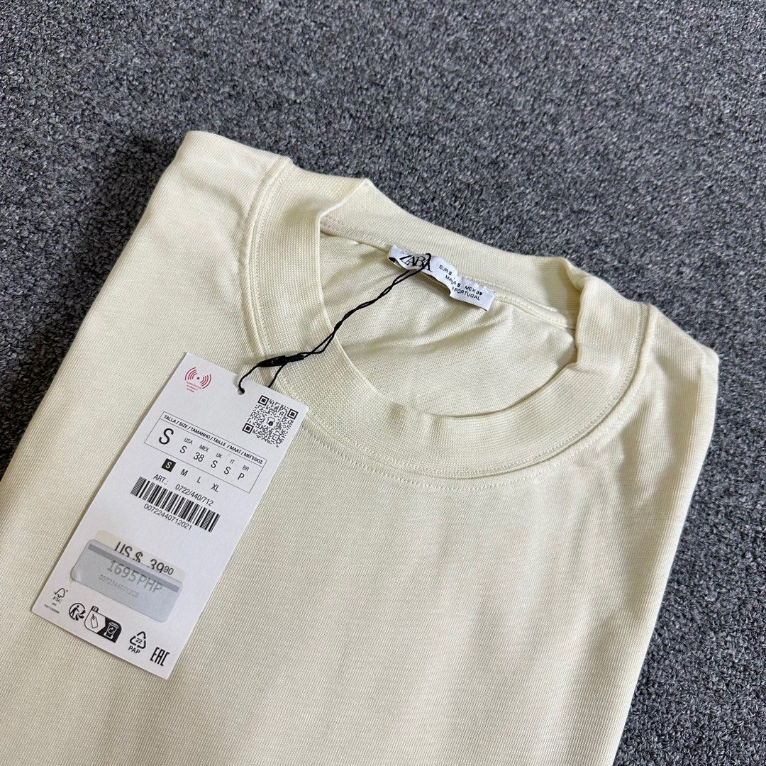 Zara Cream Tshirt (Category: Tshirts & Polo Shirts ) located in Quezon City. Submitted by leaneder23 (Listing ID 1404855664, Image 2). Description: Zara Cream T-shirt Brand new Sobrang nice ng design and fabric Bought at Zara SM Megamall Natambak lang sa cabinet The sizing runs a little bit big Ganda fitting sa 5’8” 70 kg Length: 27.5 inches Width: 22.5 inches (Perfume not included) Location: Quezon City RFS: Decluttering.