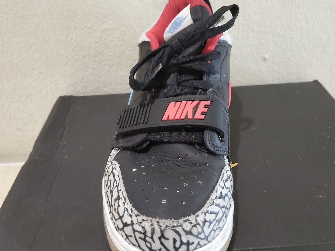 Air Jordan Legacy 312 Low - Black/Wolf Grey (Category: Sneakers) located in Kuching. Submitted by xwhitezdyl63380 (Listing ID 1405048307, Image 3). Description: - Air Jordan Legacy 312 Low sneakers - Color: Black, wolf grey, and valor blue - Features: Light blue swoosh, elephant print detailing, velcro strap with "NIKE" branding - Size: US 9, UK 8, EUR 42.5 - Includes original box -DM ME BEFORE U BUY -ONLY ACCEPT TNG AND GRABPAY.