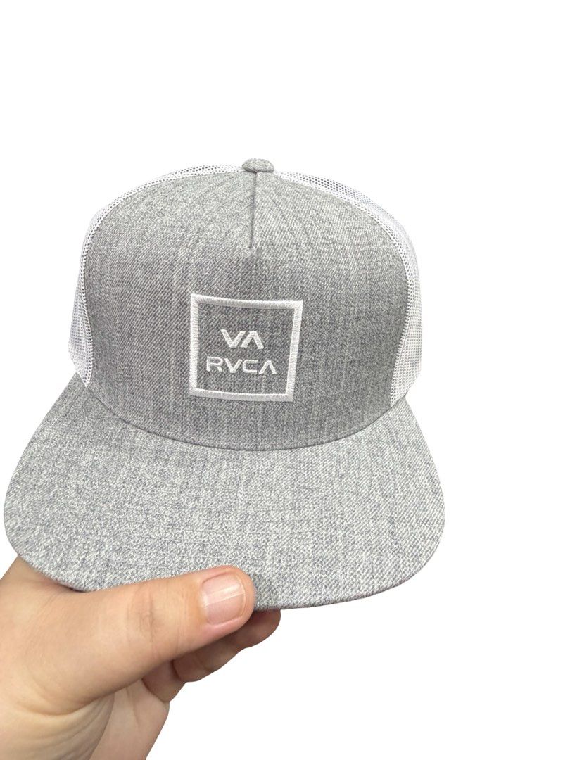 Authentic RVCA Trucker Cap (Category: Caps & Hats) located in Manila. Submitted by useyourcommonsense (Listing ID 1405077131, Image 1). Description: - RVCA trucker cap - Gray with white mesh back - RVCA logo on front - Flat brim - Adjustable snapback closure - Original price: $29.99.
