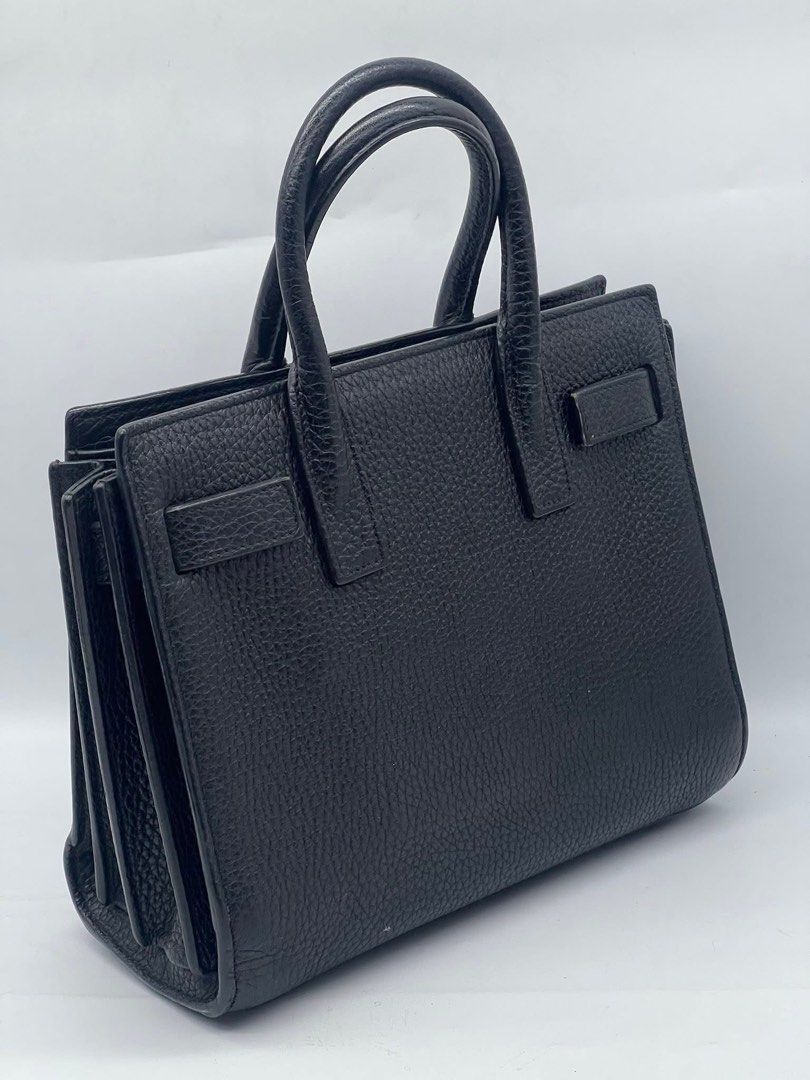 Authentic Ysl (Category: Luxury Bags & Wallets) located in Manila. Submitted by chloe_luxuries (Listing ID 1405130559, Image 3). Description: Guaranteed Original Ysl Sac de jour in Grained Leather Baby in black Still in good condition Comes with dustbag Pm for more details.