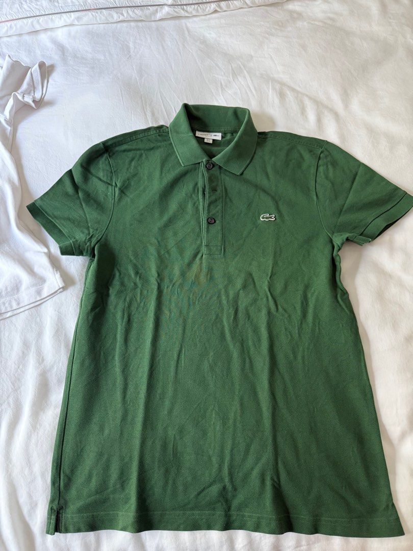 Burberry White Polo Shirt (Category: Tshirts & Polo Shirts ) located in Manila. Submitted by inob2024 (Listing ID 1405100077, Image 3). Description: White Burberry polo shirt with the brand logo on the chest. Features a classic collar and short sleeves. The shirt has a unique plaid pattern detail on the placket. Size S. Burberry polo shirt size S white and blue.