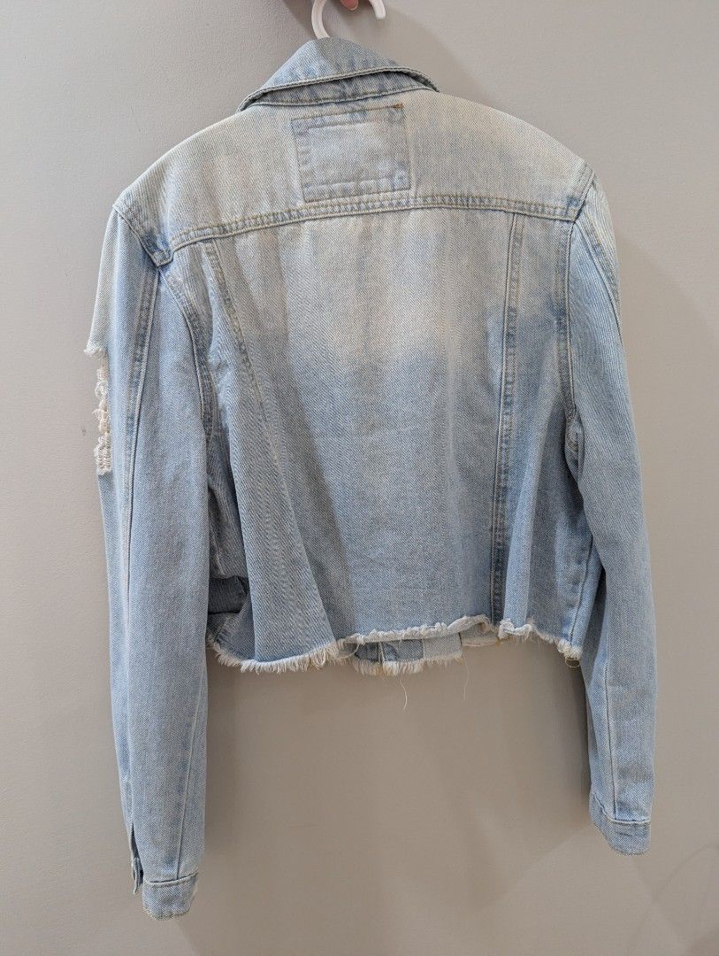 Cotton On Distressed Denim Jacket (Category: Coats, Jackets and Outerwear) located in Quezon City. Submitted by FAYNT (Listing ID 1405025620, Image 2). Description: Cotton On denim jacket will fit small to medium frames used once or twice only - Light wash - Cropped length - Distressed detailing - Button closures and pockets - Size: AUS 10, US 6, EUR 38, BRZ 40 - Great for layering.