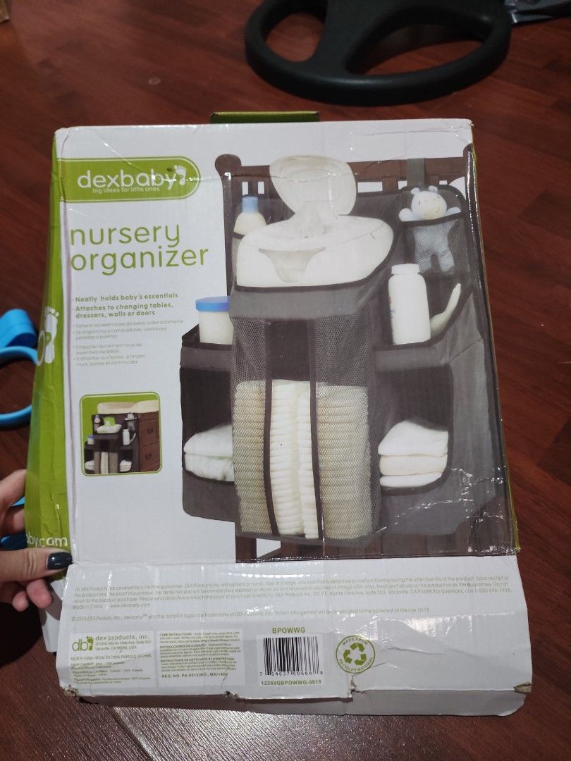 Crib Caddy / Play Pen Organizer (Category: Cots & Cribs) located in Antipolo. Submitted by juniper01 (Listing ID 1405042179, Image 3). Description: - Original price: 449 - Opened, but NEVER USED - Foldable crib caddy / organizer - Dark blue with white trim - Velcro Straps and loops - Multiple compartments - Board backing - Durable and possibly water-resistant material - With FREE Pull Rings. - Comes with the box. Pero iba yung itsura ng item sa b
