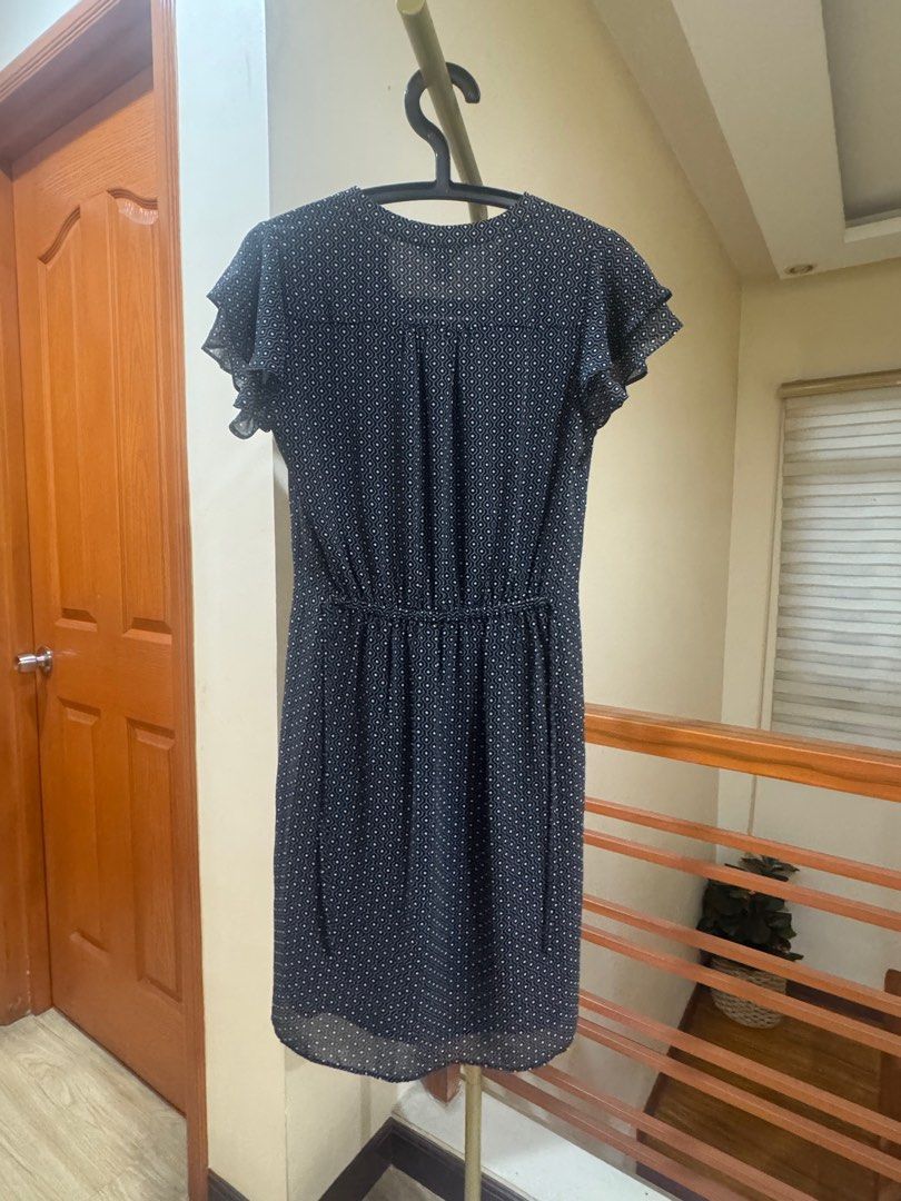 Dress H&M Polka Dot with Flutter Sleeves (Category: Dresses) located in Taytay. Submitted by miley_kay (Listing ID 1405062349, Image 2). Description: - Black dress with white polka dots - Features a flattering V-neckline - Designed with flutter sleeves - Cinched waist for a defined silhouette - Made from lightweight, flowy fabric - Knee-length - Size when laid flat: Bust 44cm, Waist 36cm, Length 89cm.
