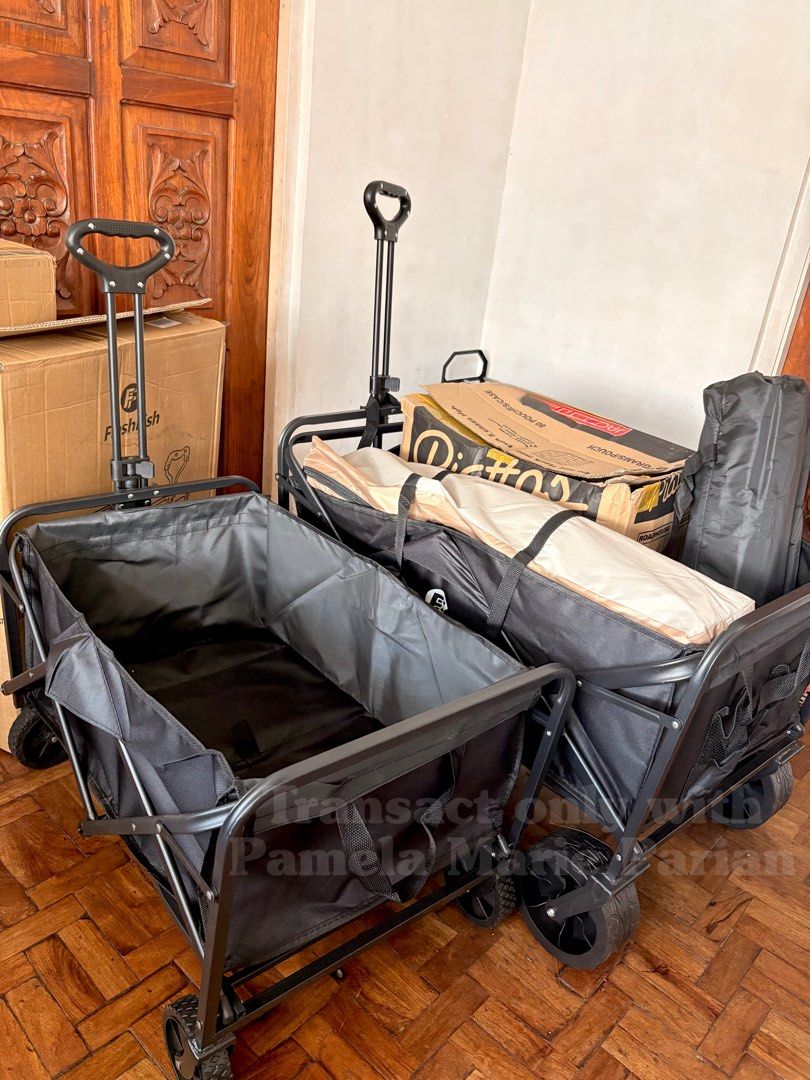 FlashFish Folding Wagon (Category: Strollers) located in Las Pinas. Submitted by phamyyy15 (Listing ID 1405046485, Image 2). Description: - New folding wagon - Black color - Includes wheels - Features a handle for pulling - Comes with a tent and accessories - Ideal for outdoor use and transporting goods.