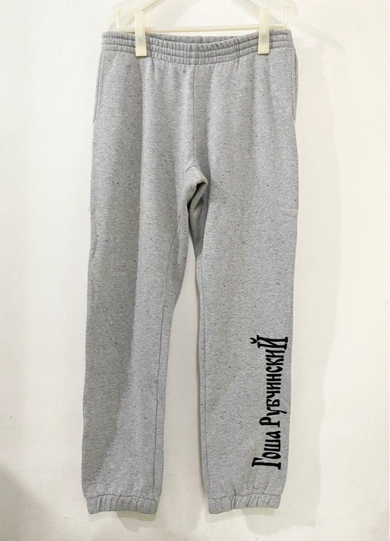 Gosha Rubchinskiy Embroidered Logo Sweatpants (Category: Joggers) located in Pasig City. Submitted by halffullbutneverfull (Listing ID 1404982629, Image 2). Description: Gosha Rubchinskiy sweatpants Color: grey Embroidered logo Regular fit (photo worn by Travis Scott) Size: L Waist: 16" Length: 39" Made in Turkey .