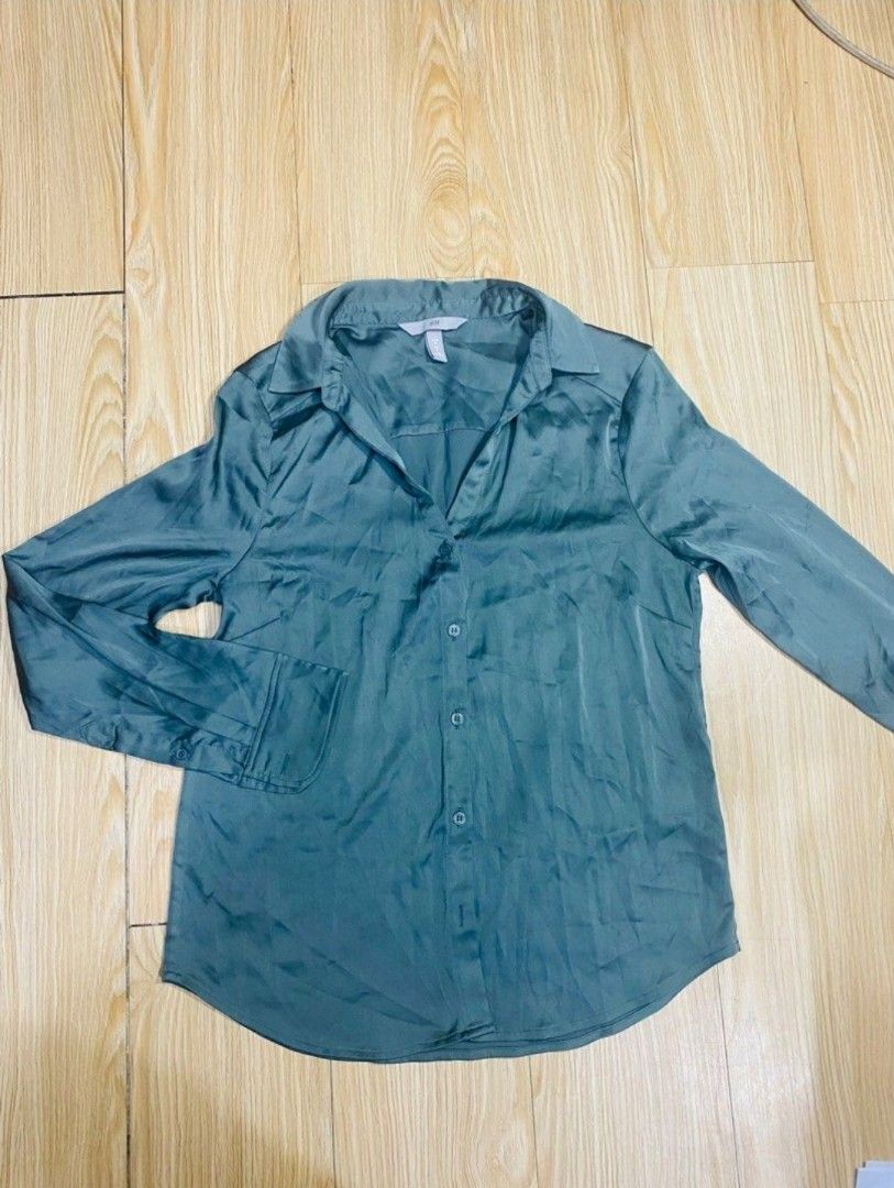 H&M Green Satin Blouse (Category: Blouses) located in Cebu City. Submitted by deecanon (Listing ID 1405096184, Image 1). Description: - H&M green satin blouse - Classic button-down style - Long sleeves - Collared neckline - Smooth, flowing texture - Suitable for casual & semi-formal occasions - Size: EUR 36, UK 10, CN 160/84A.