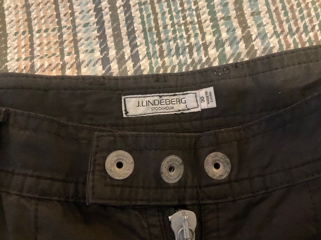 J. Lindeberg ZIPPER Black Pants Size 30 (Category: Trousers) located in Makati City. Submitted by ars1971 (Listing ID 1405158561, Image 3). Description: PLEASE READ LISTING TITLE & DESCRIPTION BEFORE INQUIRING! NO LOWBALLERS/THRIFTERS! Available if POSTED! Stylish black pants from J. Lindeberg. Features a zip fly, multiple pockets, and a size 30. SLIM FIT The pants have a unique design with zippers on the front pockets and a button closure on the