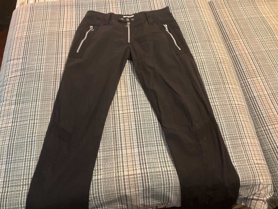 J. Lindeberg ZIPPER Black Pants Size 30 (Category: Trousers) located in Makati City. Submitted by ars1971 (Listing ID 1405158561, Image 1). Description: PLEASE READ LISTING TITLE & DESCRIPTION BEFORE INQUIRING! NO LOWBALLERS/THRIFTERS! Available if POSTED! Stylish black pants from J. Lindeberg. Features a zip fly, multiple pockets, and a size 30. SLIM FIT The pants have a unique design with zippers on the front pockets and a button closure on the