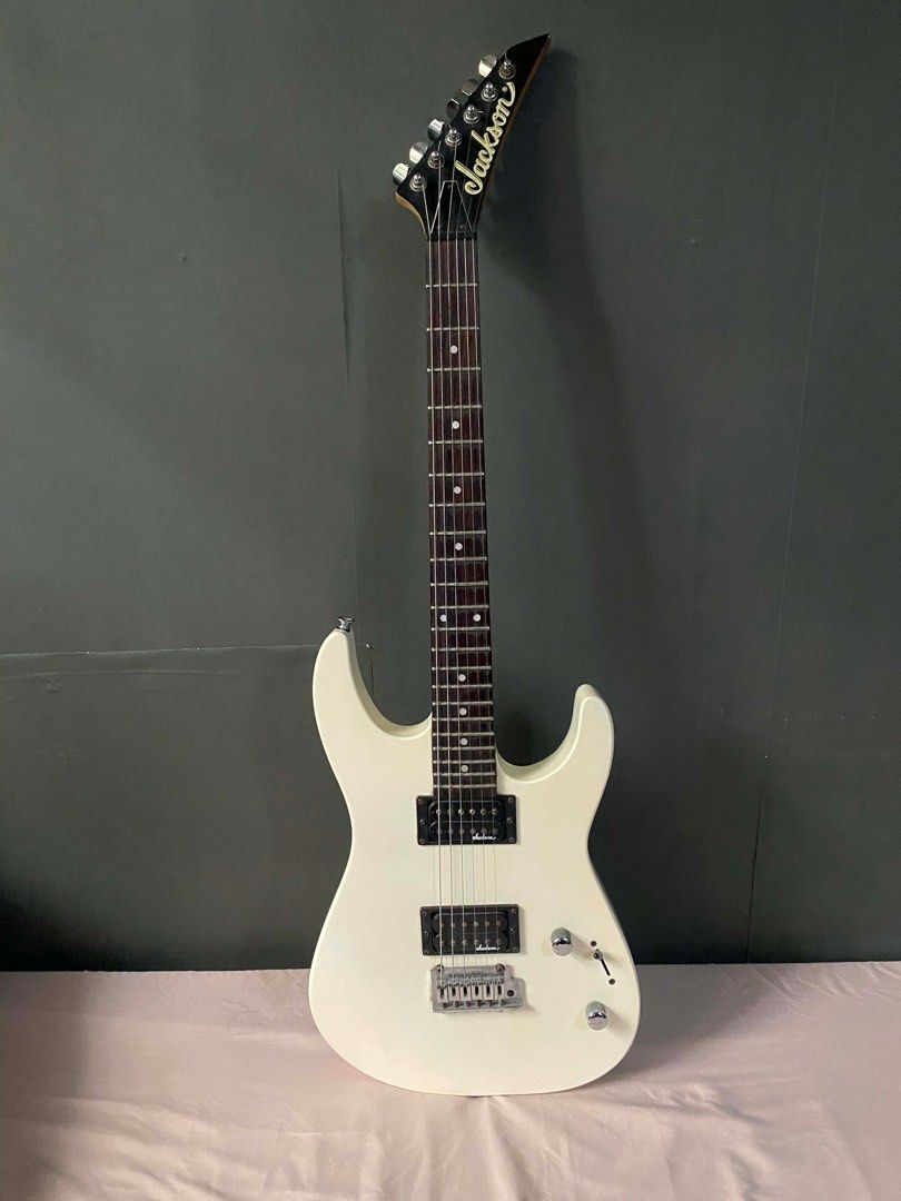 Jackson JS11 Dinky (Category: Musical Instruments) located in Quezon City. Submitted by kairodeads (Listing ID 1404988858, Image 1). Description: Jackson JS11 Dinky Electric Guitar • Stock humbucker pickups • Rosewood fretboard • Cosmetics: 7/10 (Signs of usage) • Playability: 9/10 (2 years since last set up pero walang major issues) • No fret buzz • Needs cleaning • With free Clifton Gigbag RFS: Need funds, extra guitar Original price (JB Music)