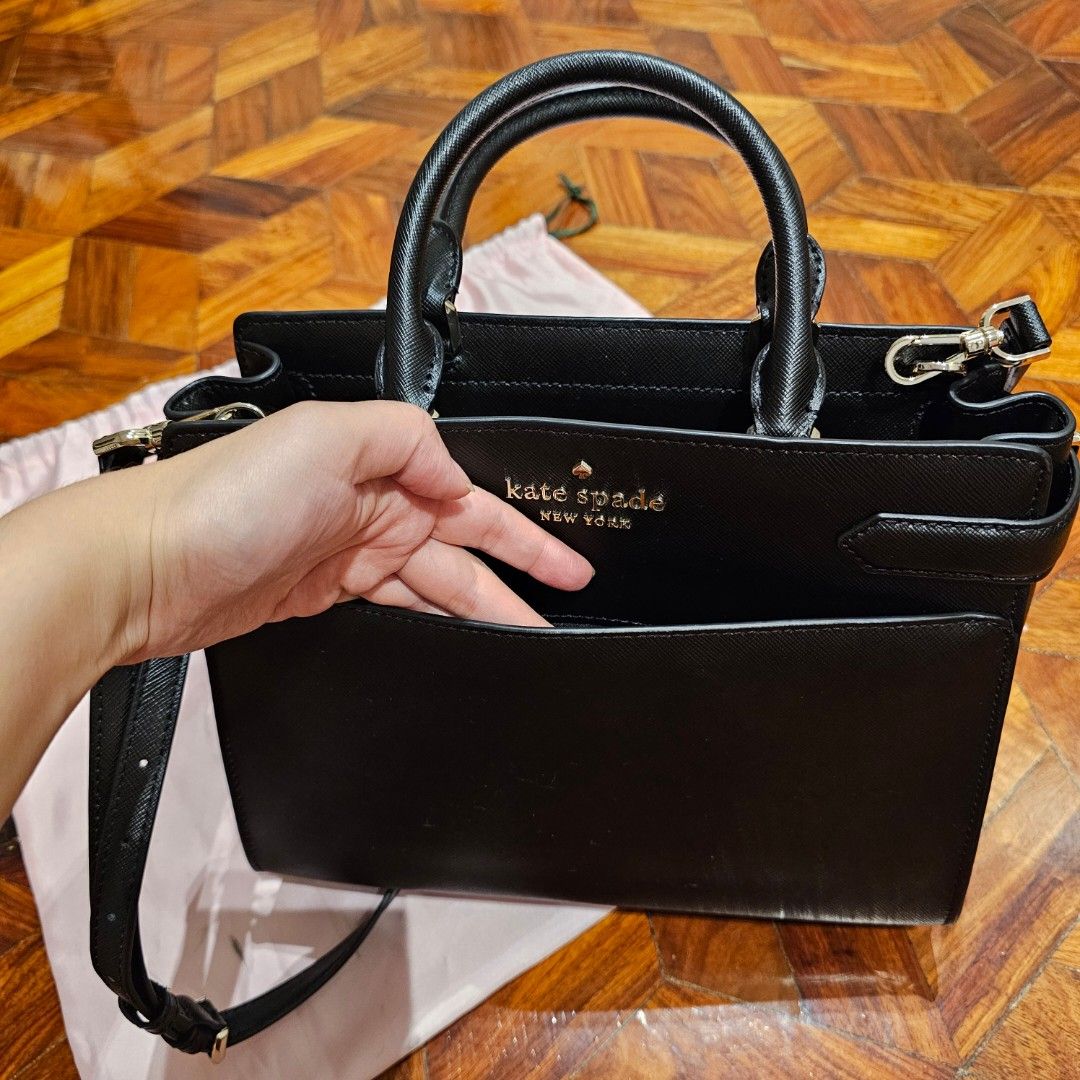 Kate Spade Staci Medium Satchel Bag (Category: Luxury Bags & Wallets) located in Valenzuela. Submitted by seee.nicooole (Listing ID 1405065059, Image 3). Description: Only used once. No flaws. Original. Bought from the US. 11" W x 9" H x 6" D 5" handle drop, 40" strap drop Top zip closure Dual rolled top handles, optional crossbody strap.