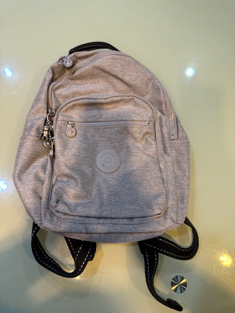Kipling Original Mini Backpack (Category: Backpacks) located in Manila. Submitted by rychris34 (Listing ID 1405048695, Image 1). Description: - Original Kipling mini backpack - Light grey fabric Meet up at Eastwood Mall or shipping c/o buyer Mop: Gcash or BDO Rfs: decluttering.
