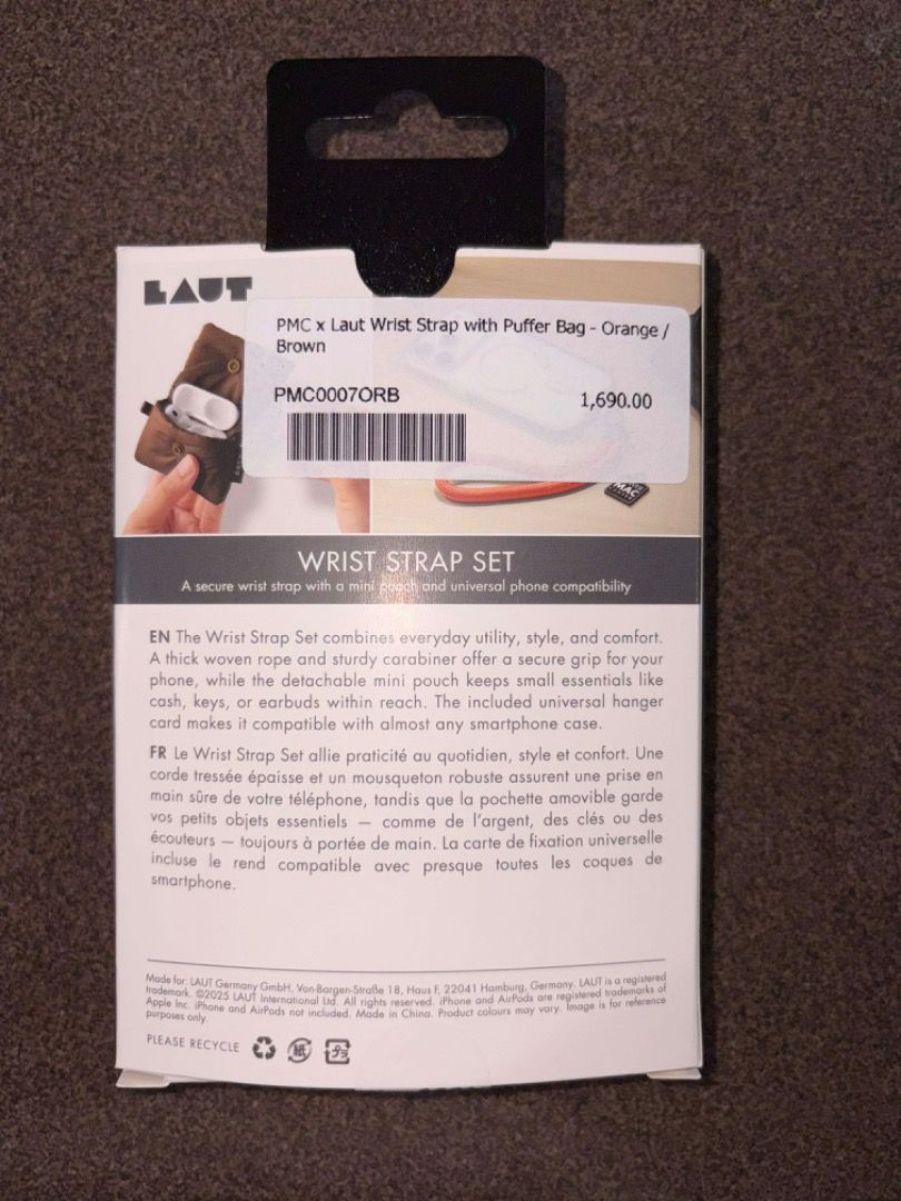 LAUT Wrist Strap Set with Puffer Bag - Orange & Brown (Category: Other Mobile & Gadget Accessories) located in Bacolod City. Submitted by psj205 (Listing ID 1405104663, Image 2). Description: - Includes wrist strap and mini pouch - Universal phone compatibility - Brand new & never used Original, from Power Mac.