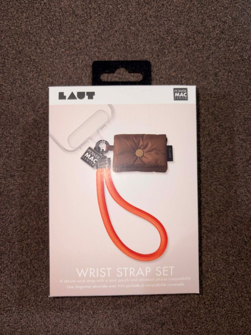 LAUT Wrist Strap Set with Puffer Bag - Orange & Brown (Category: Other Mobile & Gadget Accessories) located in Bacolod City. Submitted by psj205 (Listing ID 1405104663, Image 1). Description: - Includes wrist strap and mini pouch - Universal phone compatibility - Brand new & never used Original, from Power Mac.